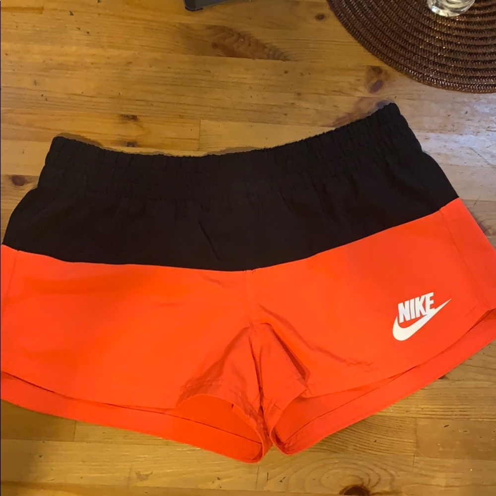Nike shorts pink with pocket in back for phone